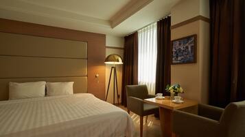 Premium bedding, down comforters, Select Comfort beds, in-room safe