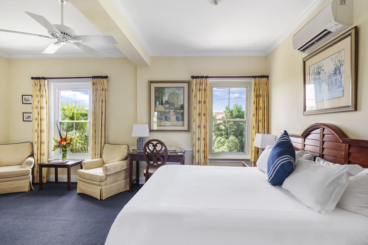 deluxe suite (mini) | living area | 42-inch smart tv with cable channels, tv, netflix