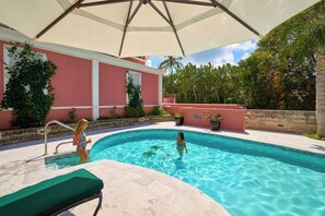 Outdoor pool, pool umbrellas, sun loungers