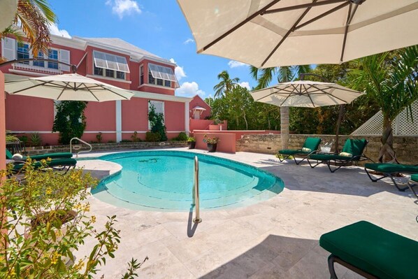 Outdoor pool, pool umbrellas, sun loungers