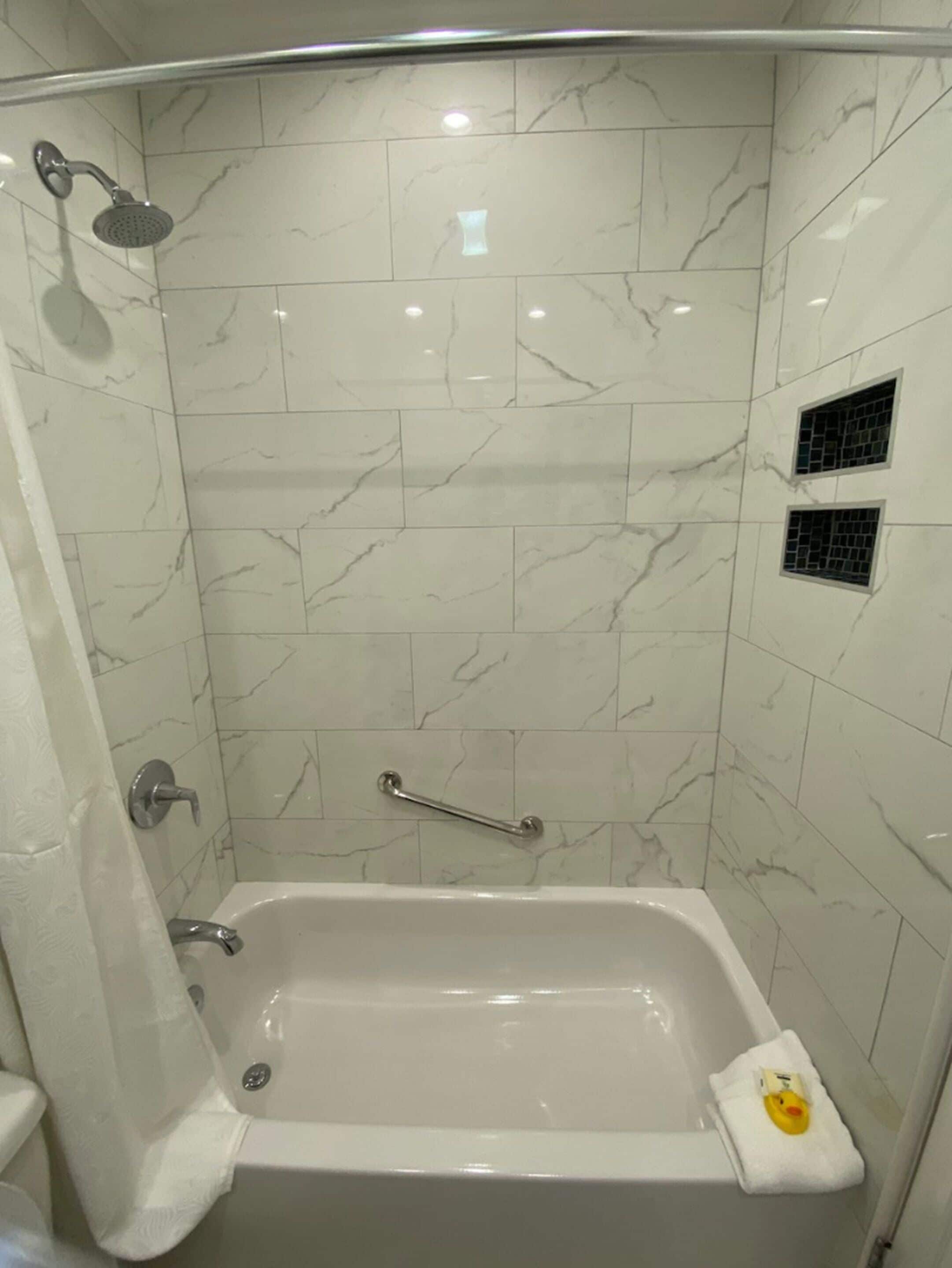 combined shower/bathtub, free toiletries, hair dryer, bathrobes