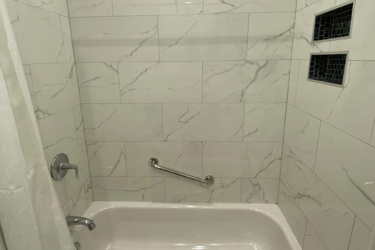 combined shower/bathtub, free toiletries, hair dryer, bathrobes