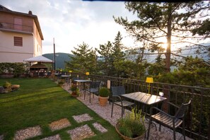 Breakfast, lunch, dinner served; Regional cuisine, garden views 