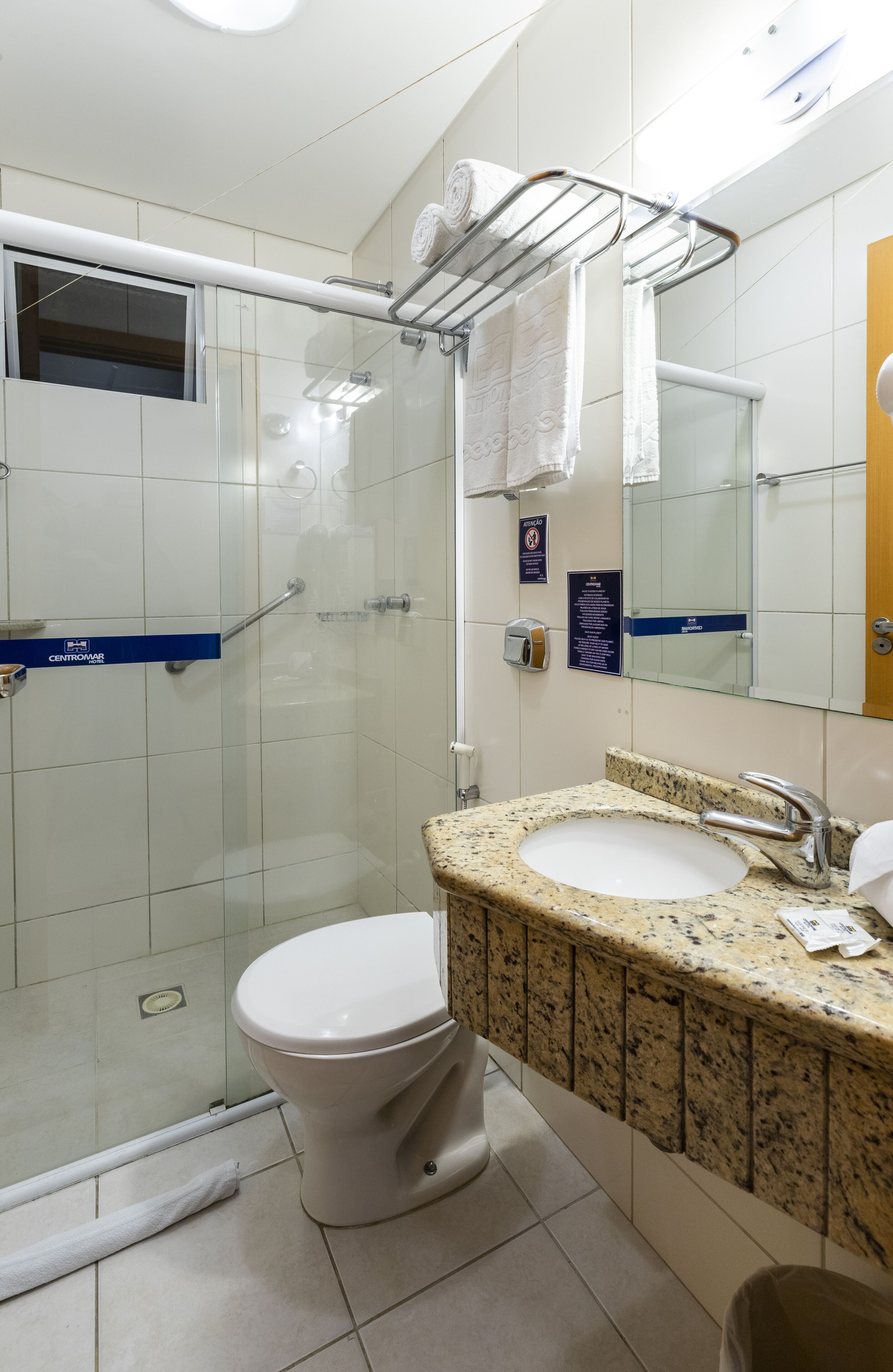 standard single room | bathroom | separate bathtub and shower, jetted bath, hair dryer, towels