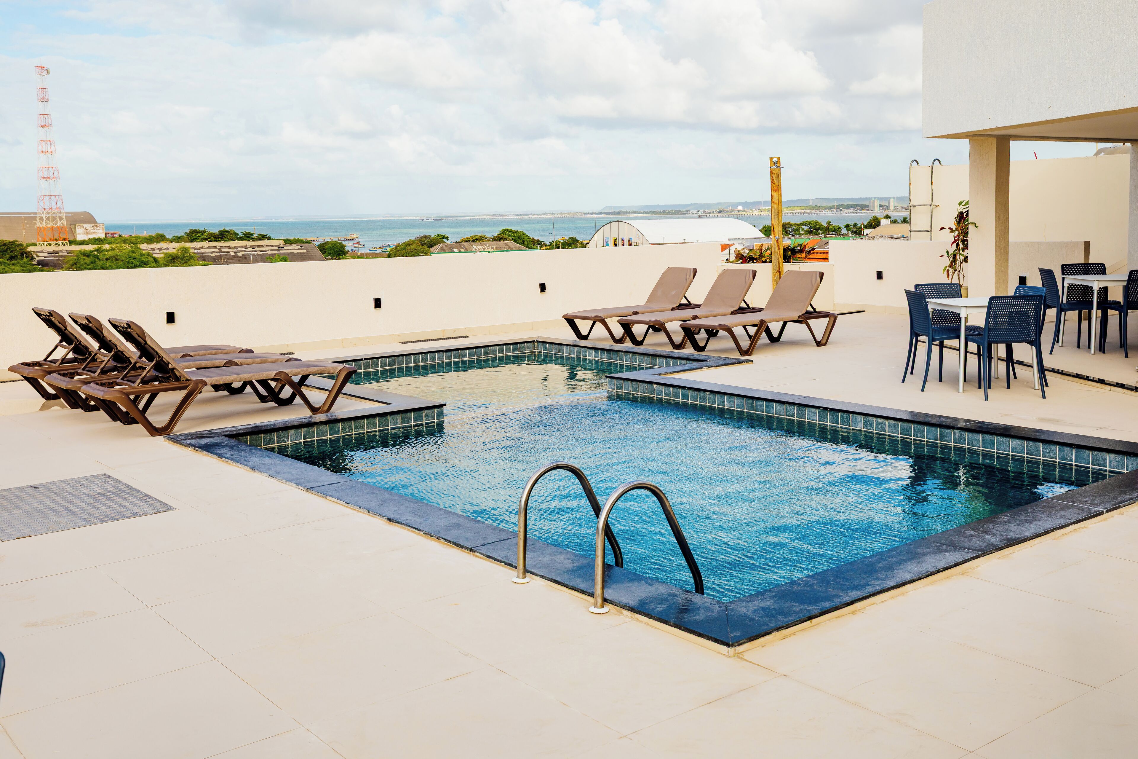 Outdoor pool, pool umbrellas, sun loungers