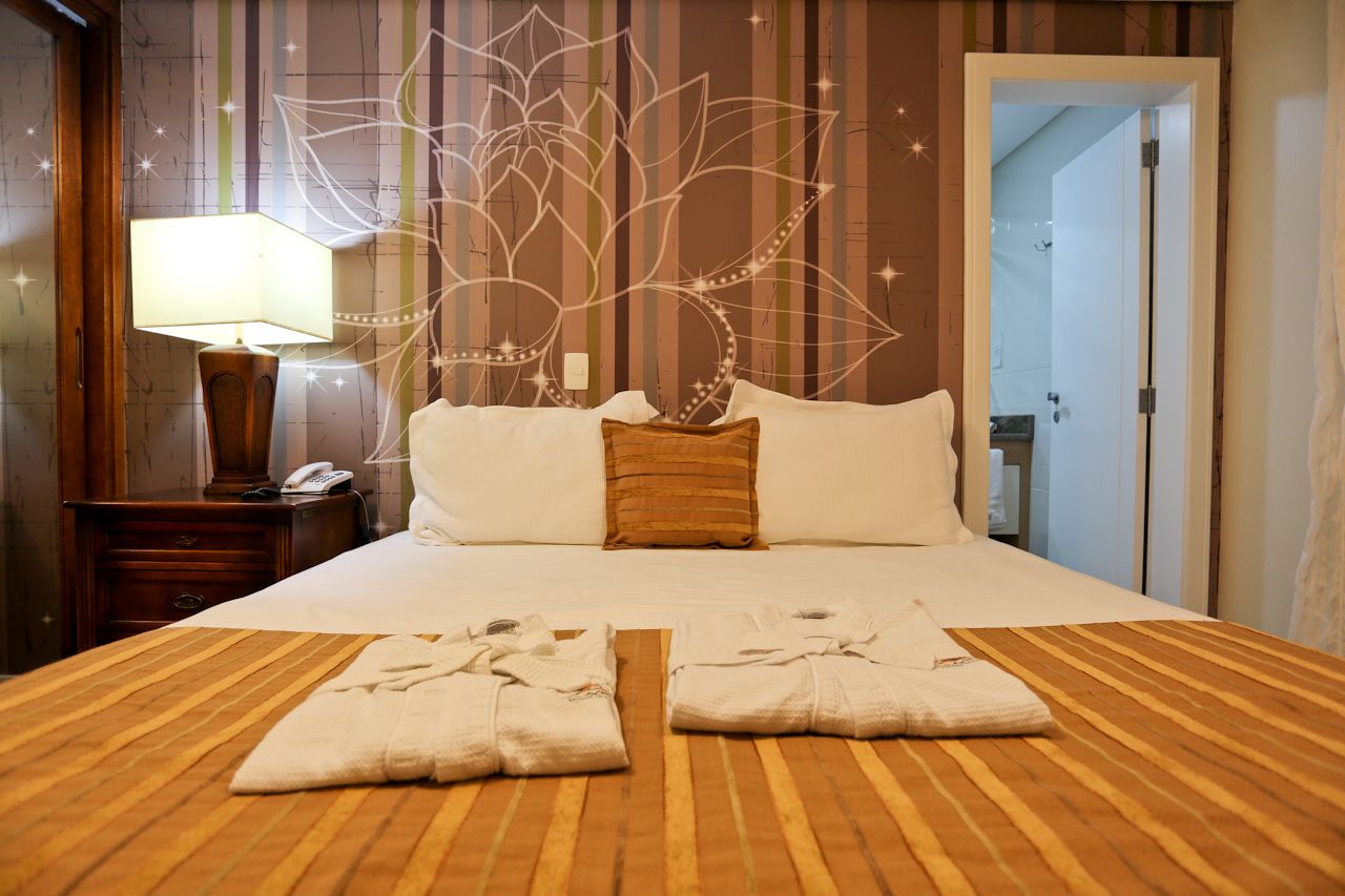 egyptian cotton sheets, down duvets, pillow-top beds, minibar