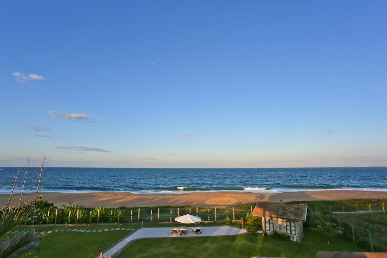on the beach, sun-loungers, beach umbrellas, beach towels