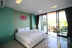 Standard Double or Twin Room | Living room | Flat-screen TV
