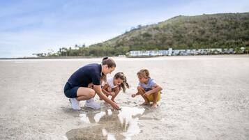 Guests can enjoy a relaxing day on the beach with access to the sandy shore.