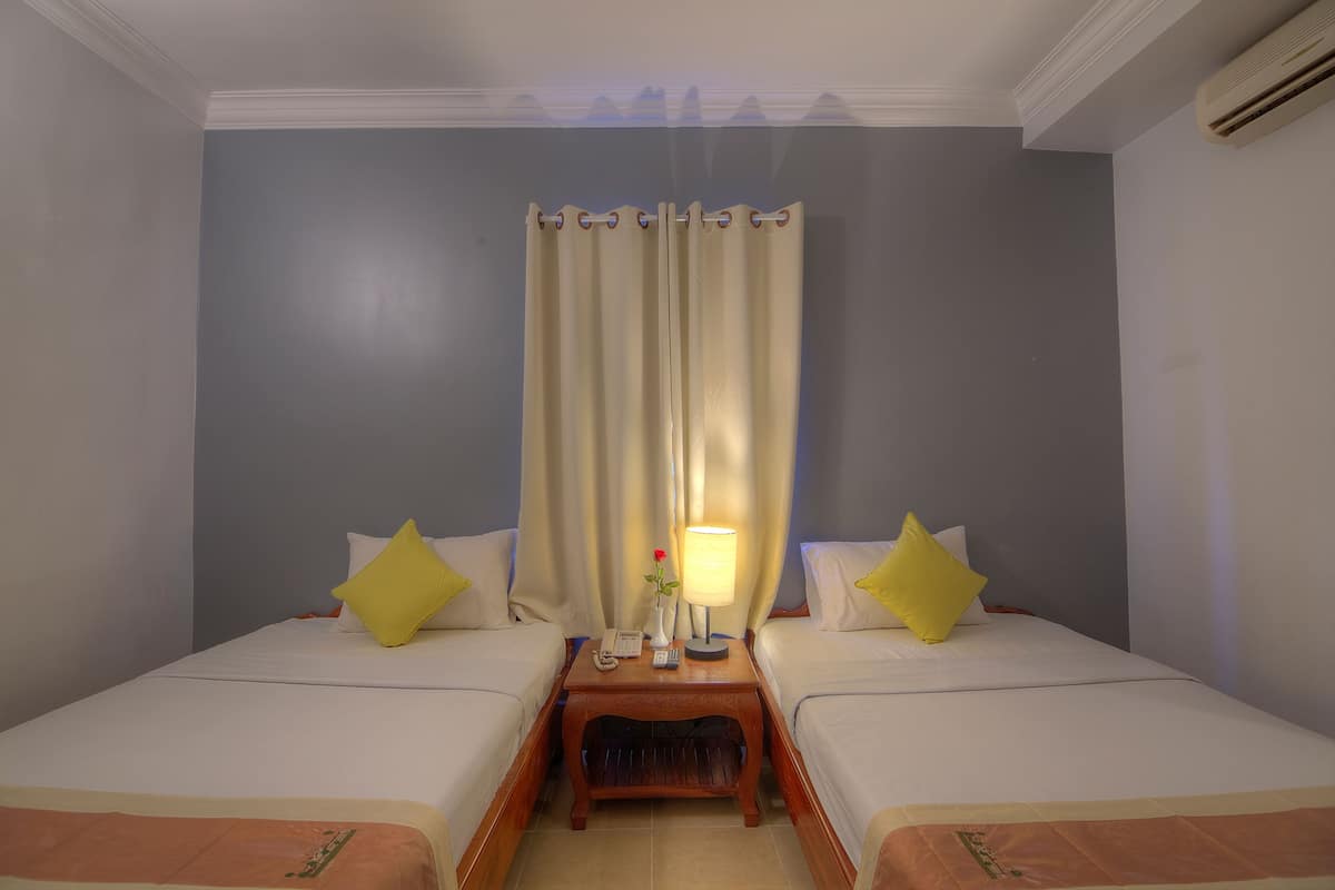 Deluxe-Zweibettzimmer, 2 Einzelbetten | Pillowtop-Betten, Minibar, individuell dekoriert