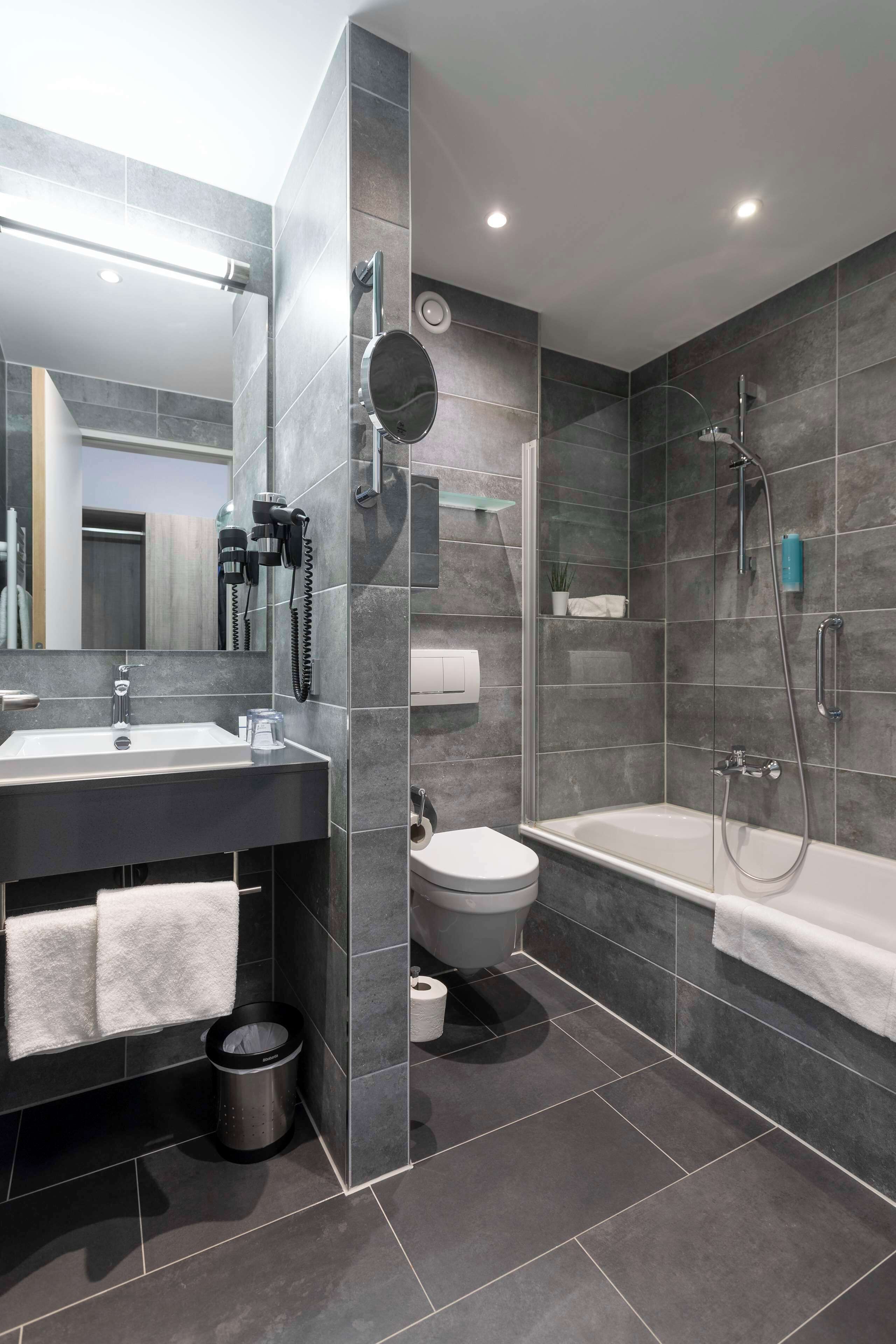 business room, 1 double bed (converts to 2 twin beds) | bathroom | shower, hair dryer, towels, soap