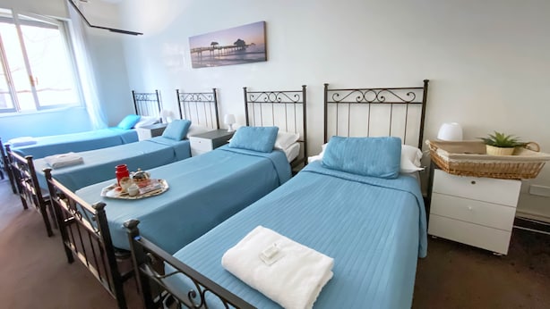 Quadruple Room, Shared Bathroom | Desk, laptop workspace, iron/ironing board, free WiFi - B&B I Am Here - Gioia 66 (Milan)