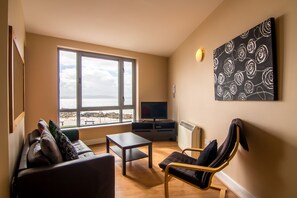 Standard-Apartment, 1 Schlafzimmer | Wohnzimmer | Flachbildfernseher