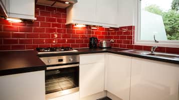 Studio | Private kitchen | Full-size fridge, microwave, oven, stovetop