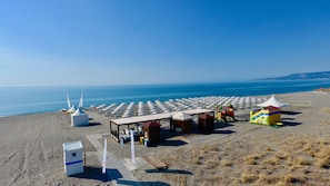 Private beach, sun-loungers, beach umbrellas, beach volleyball