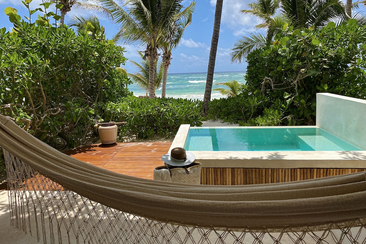 balcony area of The Beach Tulum, fronting the beach with private plunge pool and swing