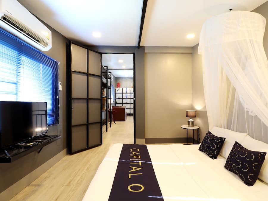 Suíte, 2 quartos | Escrivaninha, Wi-Fi de cortesia, roupa de cama