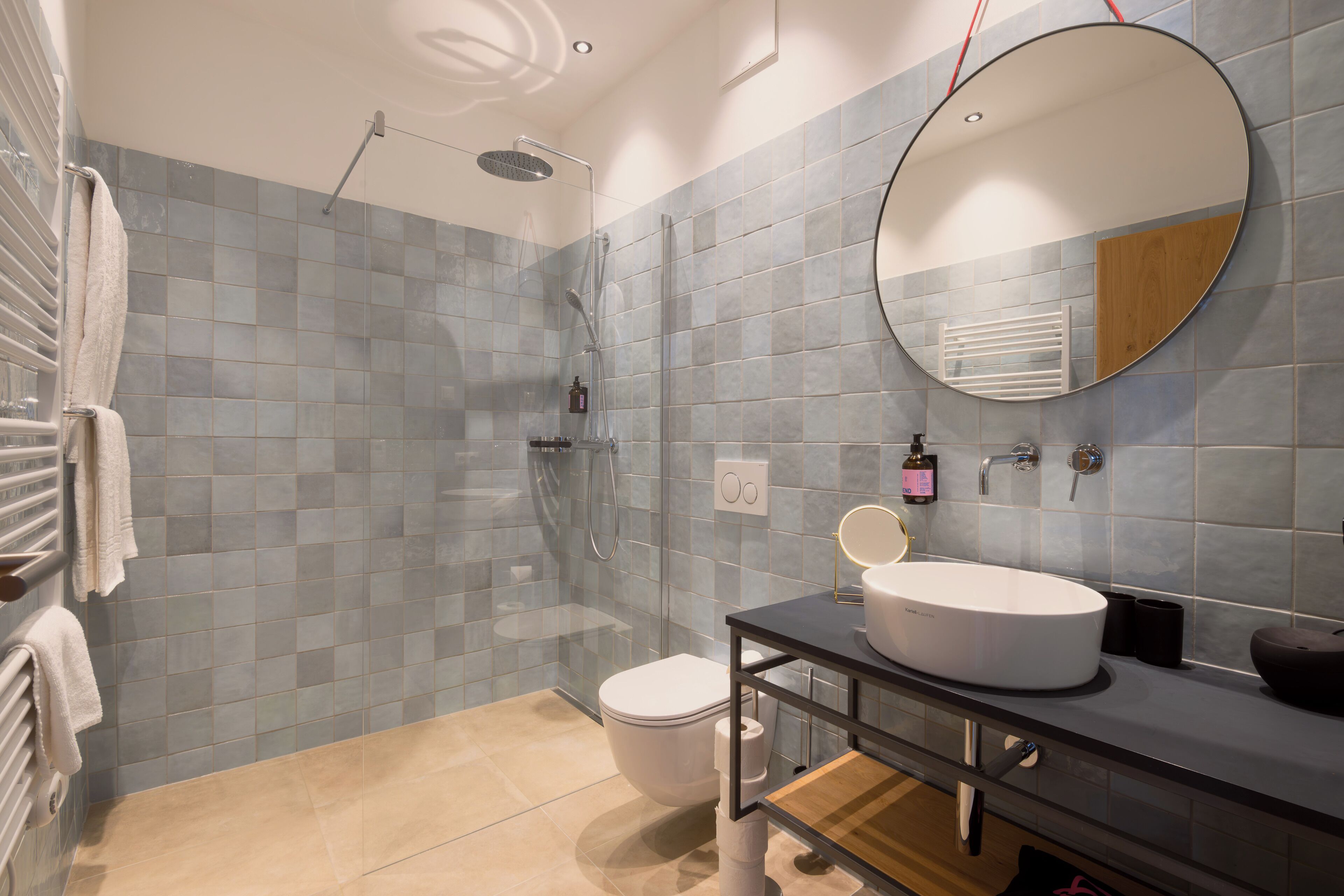 comfort studio | bathroom | rainfall showerhead, free toiletries, hair dryer, towels