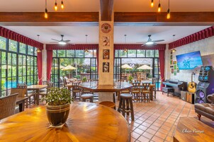 Breakfast, lunch, dinner served; Thai cuisine, pool views 