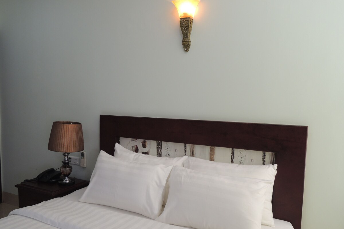 Pillow-top beds, free minibar items, in-room safe