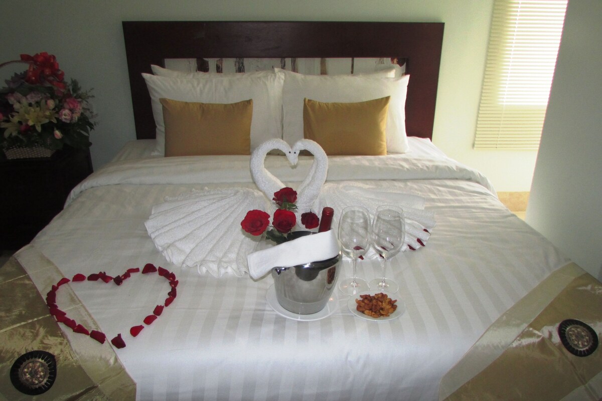 Pillow-top beds, free minibar items, in-room safe