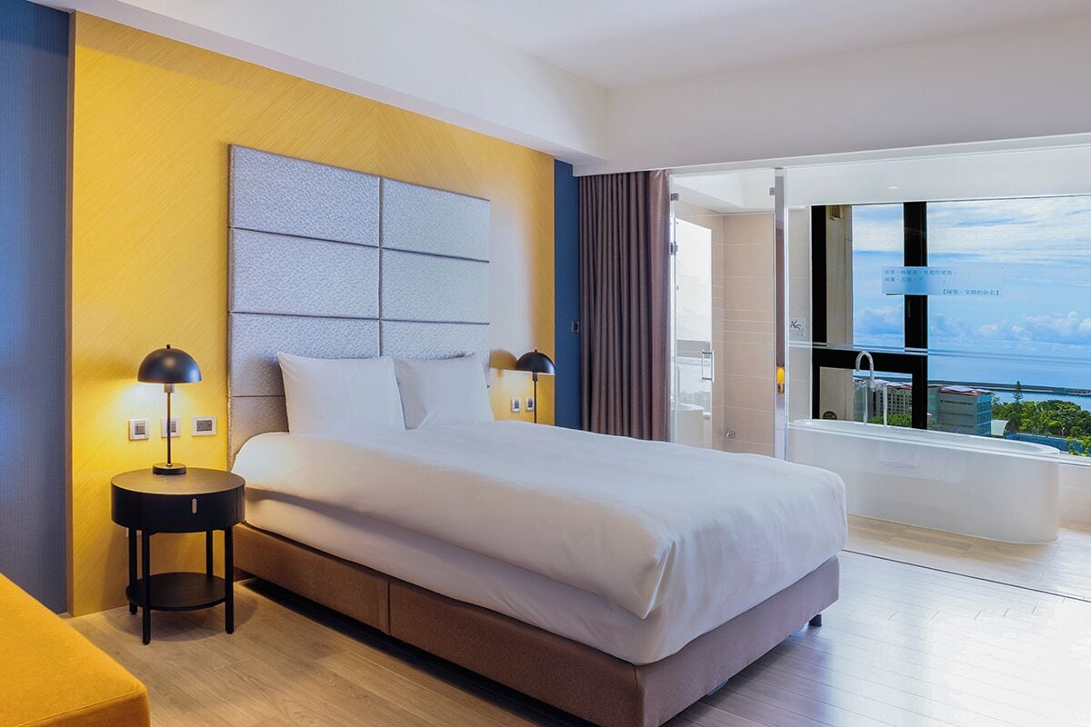 Premier King Room with Ocean View | Down comforters, desk, laptop workspace, blackout drapes