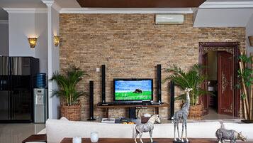 Family Villa, 2 Bedrooms, Private Pool, Hill View | Living room | LCD TV, video-game console, DVD player, iPod dock