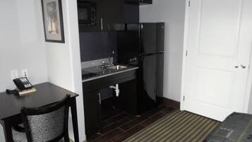 Fridge, microwave, coffee/tea maker, dining tables
