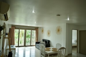 Deluxe Studio, Non Smoking | Living area | TV - Ampha Place Hotel (Koh Samui)