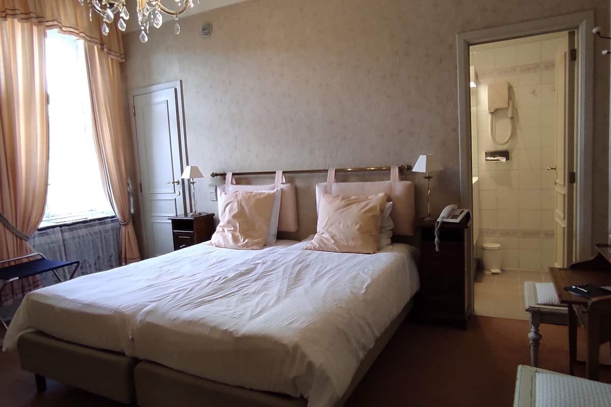 standard double room, courtyard area | premium bedding, cots/infant beds, rollaway beds, free wifi