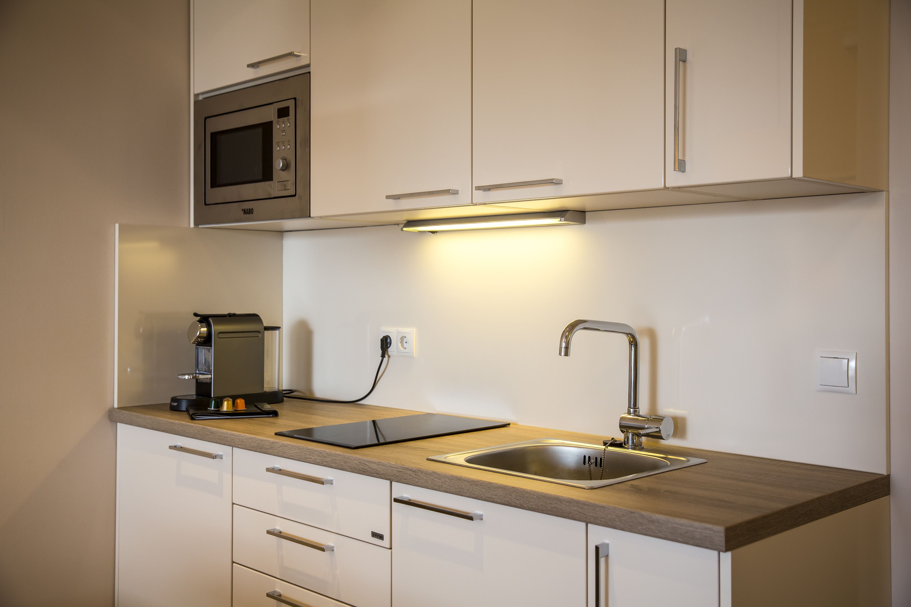 fridge, microwave, espresso maker, electric kettle