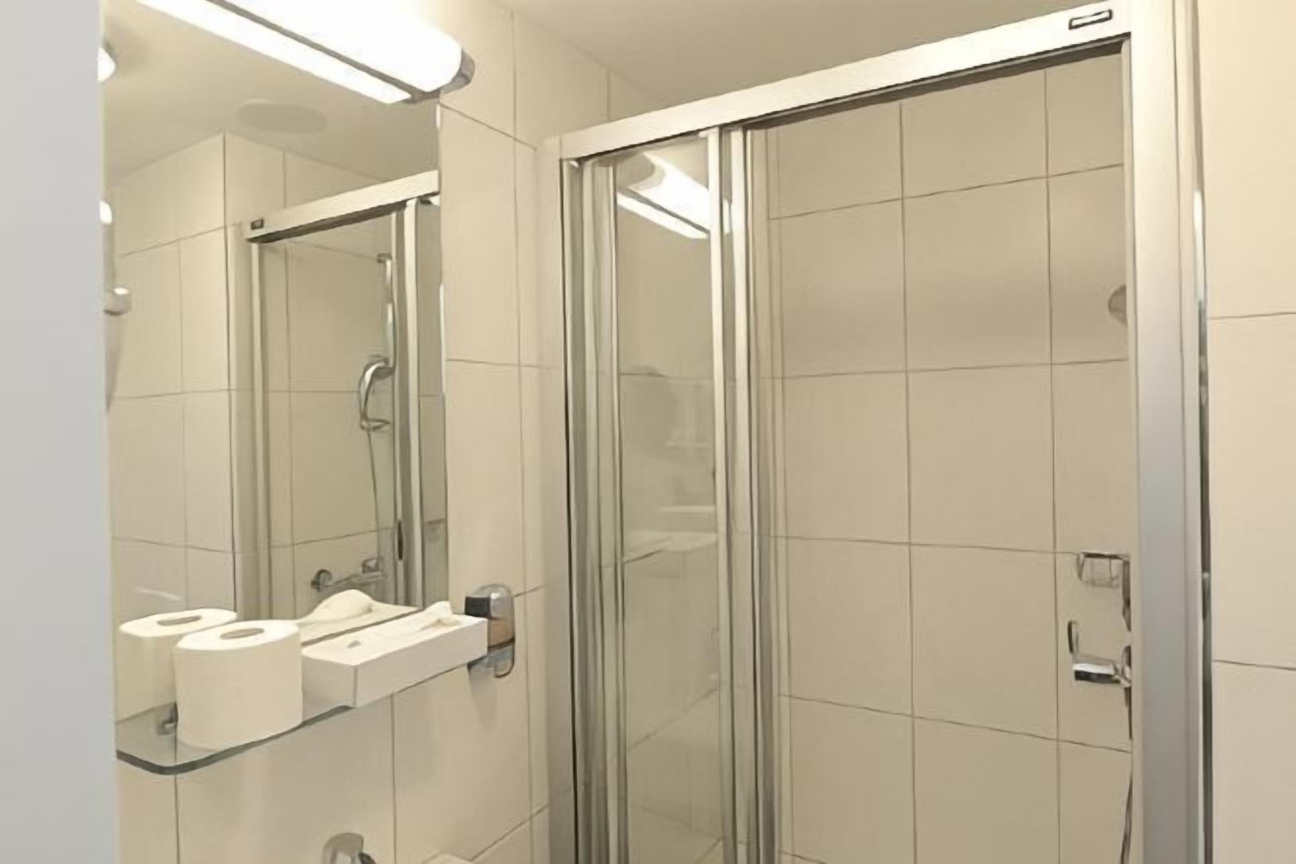 Shower, free toiletries, hair dryer, towels