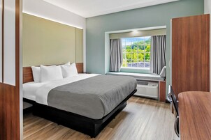 Suite, 1 King Bed with Sofa bed, Non Smoking | Desk, laptop workspace, iron/ironing board, free cribs/infant beds