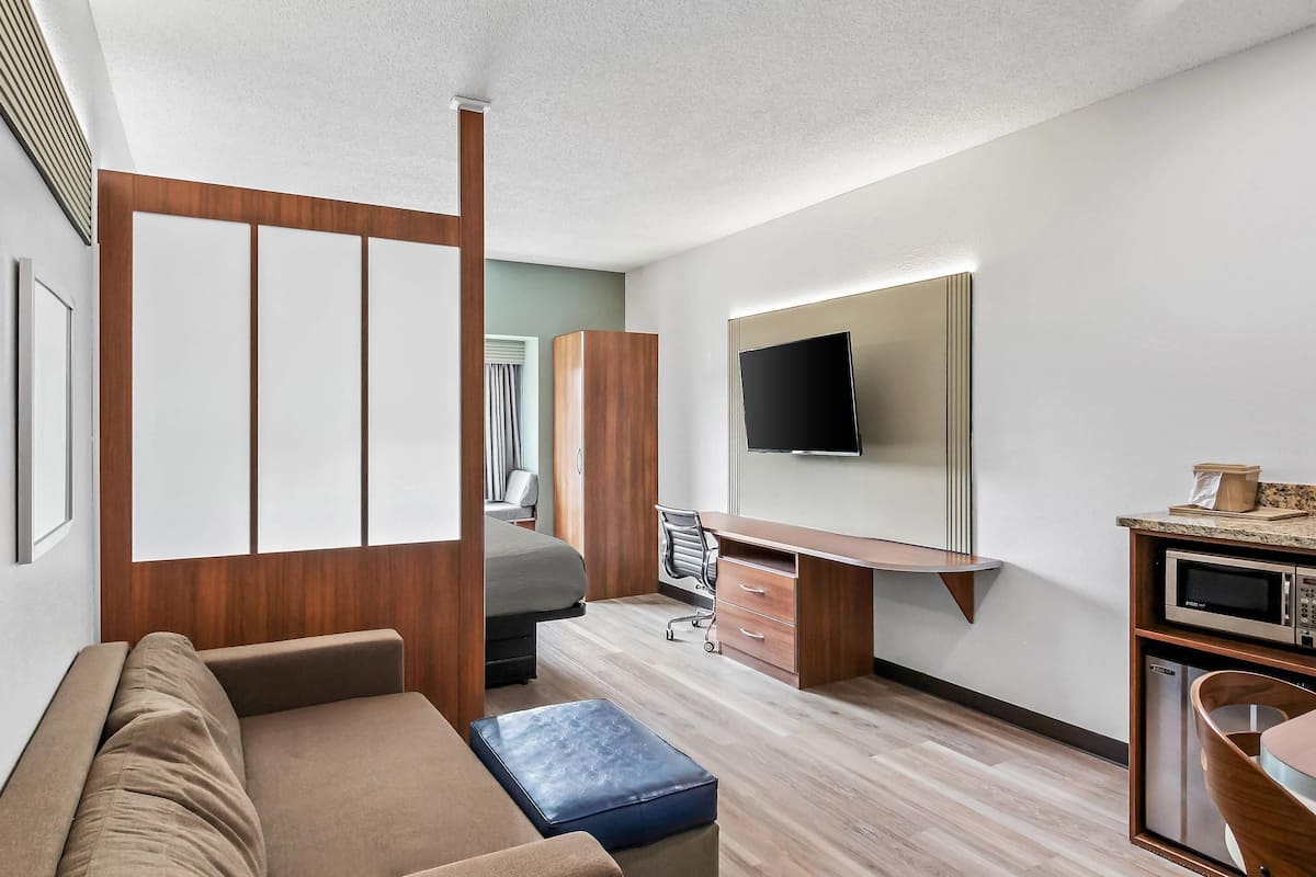 Suite, 1 King Bed with Sofa bed, Non Smoking | Desk, laptop workspace, iron/ironing board, free cribs/infant beds