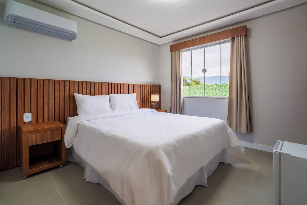 Süit (Tropical) | 1 yatak odası, minibar, odada kasa, çarşaf takımı