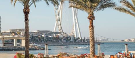 2 outdoor pools, open 9 AM to 9 PM, pool umbrellas, pool loungers