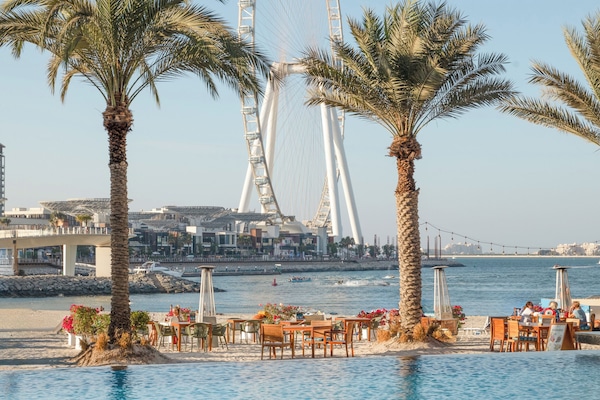 2 outdoor pools, open 9 AM to 9 PM, pool umbrellas, sun loungers
