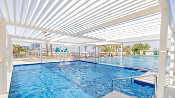 2 outdoor pools, open 9 AM to 9 PM, pool umbrellas, sun loungers
