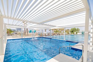 2 outdoor pools, open 9 AM to 9 PM, pool umbrellas, sun loungers