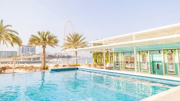 2 outdoor pools, open 9 AM to 9 PM, pool umbrellas, sun loungers