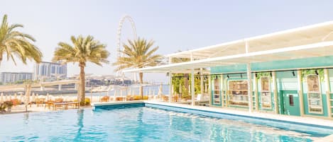 2 outdoor pools, open 9 AM to 9 PM, pool umbrellas, sun loungers