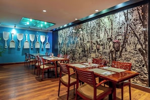 Breakfast, lunch, dinner served; international cuisine, pool views