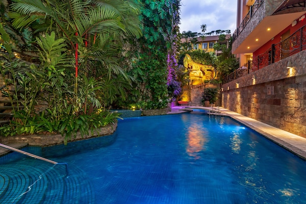 Outdoor pool, open 8:00 AM to 9:00 PM, pool loungers