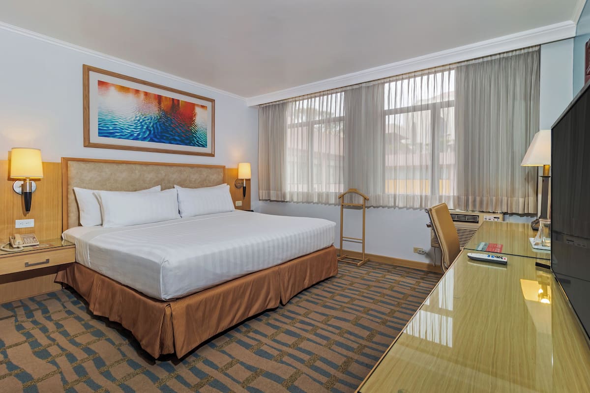 Minibar, caja fuerte, escritorio y espacio para trabajar con un portátil