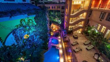 Outdoor pool, open 8:00 AM to 9:00 PM, sun loungers