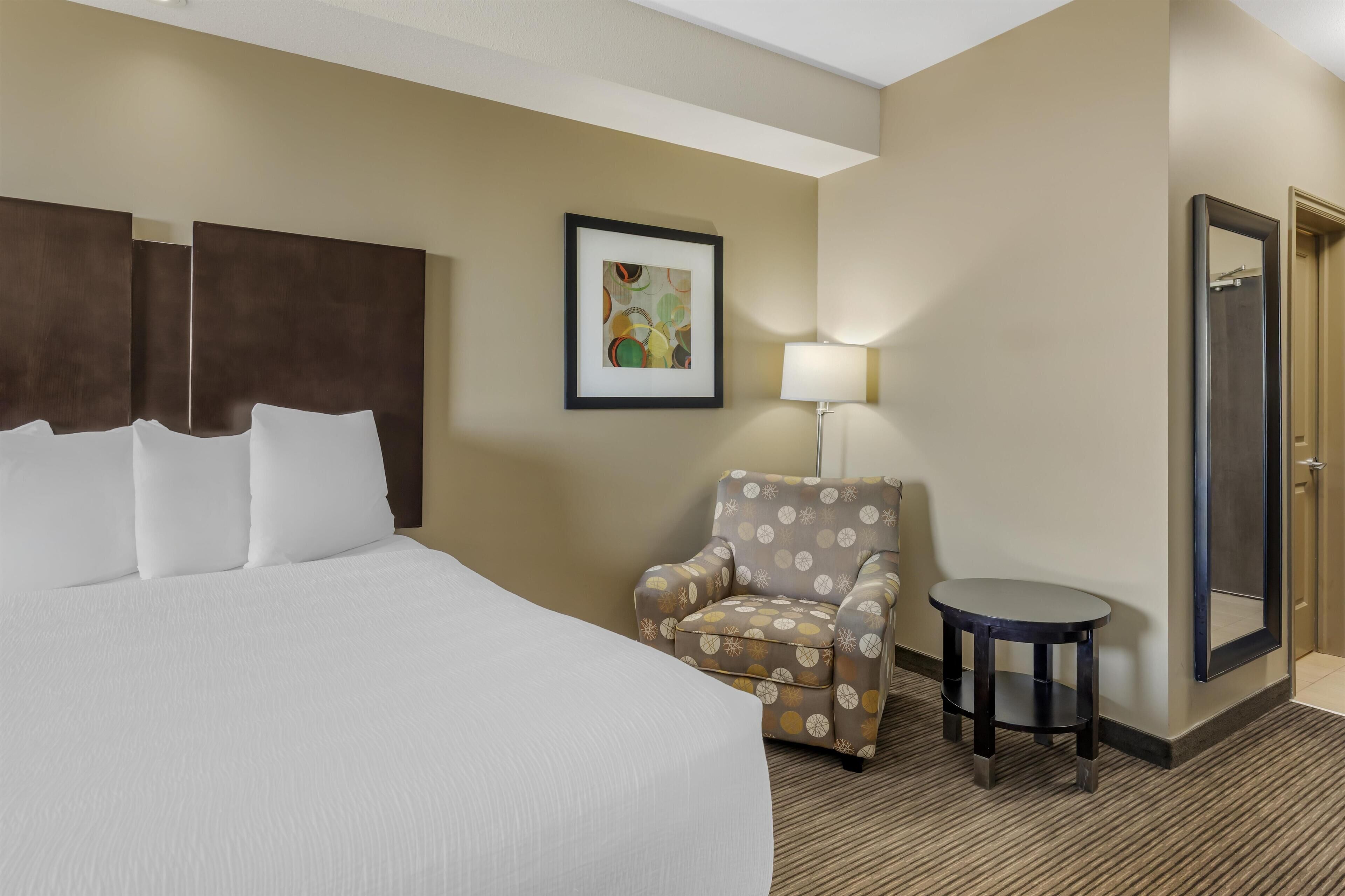 Standard Room, 2 Queen Beds, Non Smoking | In-room safe, desk, laptop workspace, blackout drapes