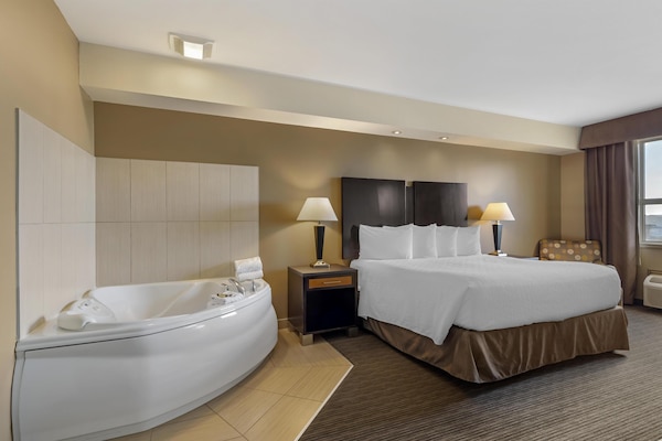 Suite, 1 King Bed, Non Smoking, Jetted Tub | In-room safe, desk, laptop workspace, blackout drapes