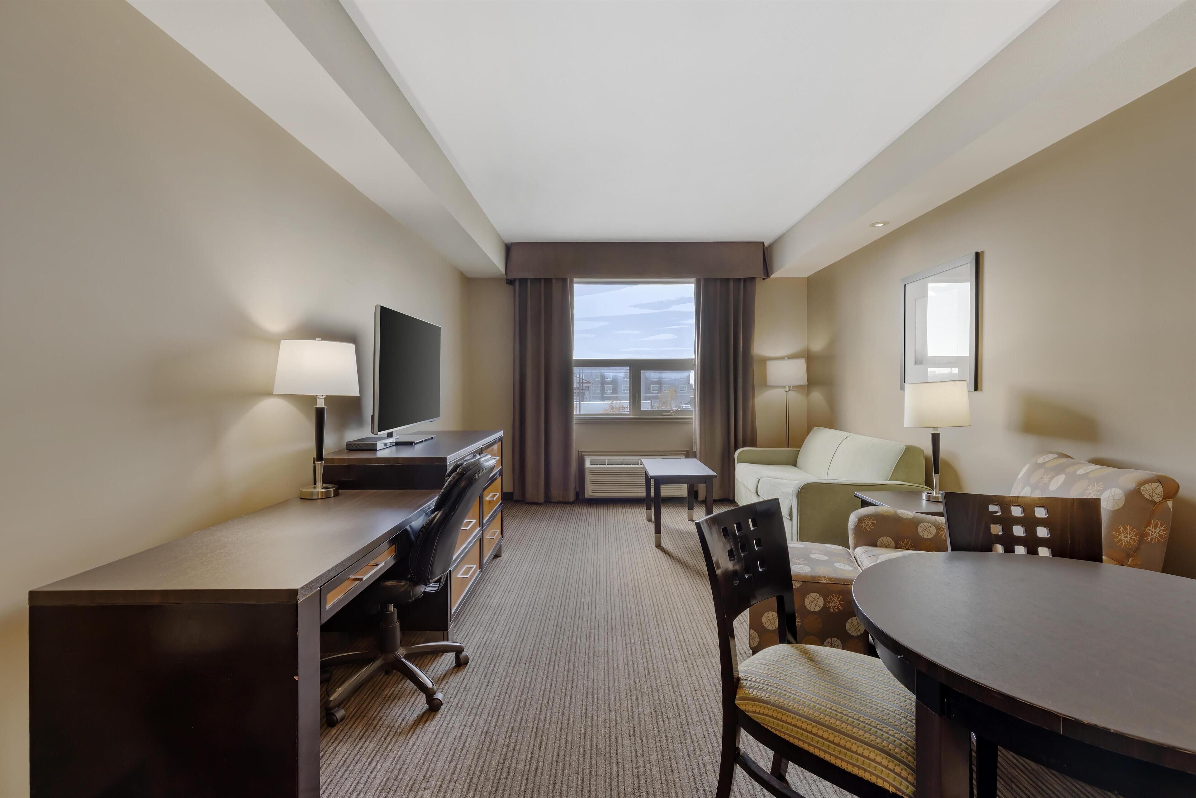 Suite, 1 King Bed, Non Smoking, Jetted Tub | In-room safe, desk, laptop workspace, blackout drapes