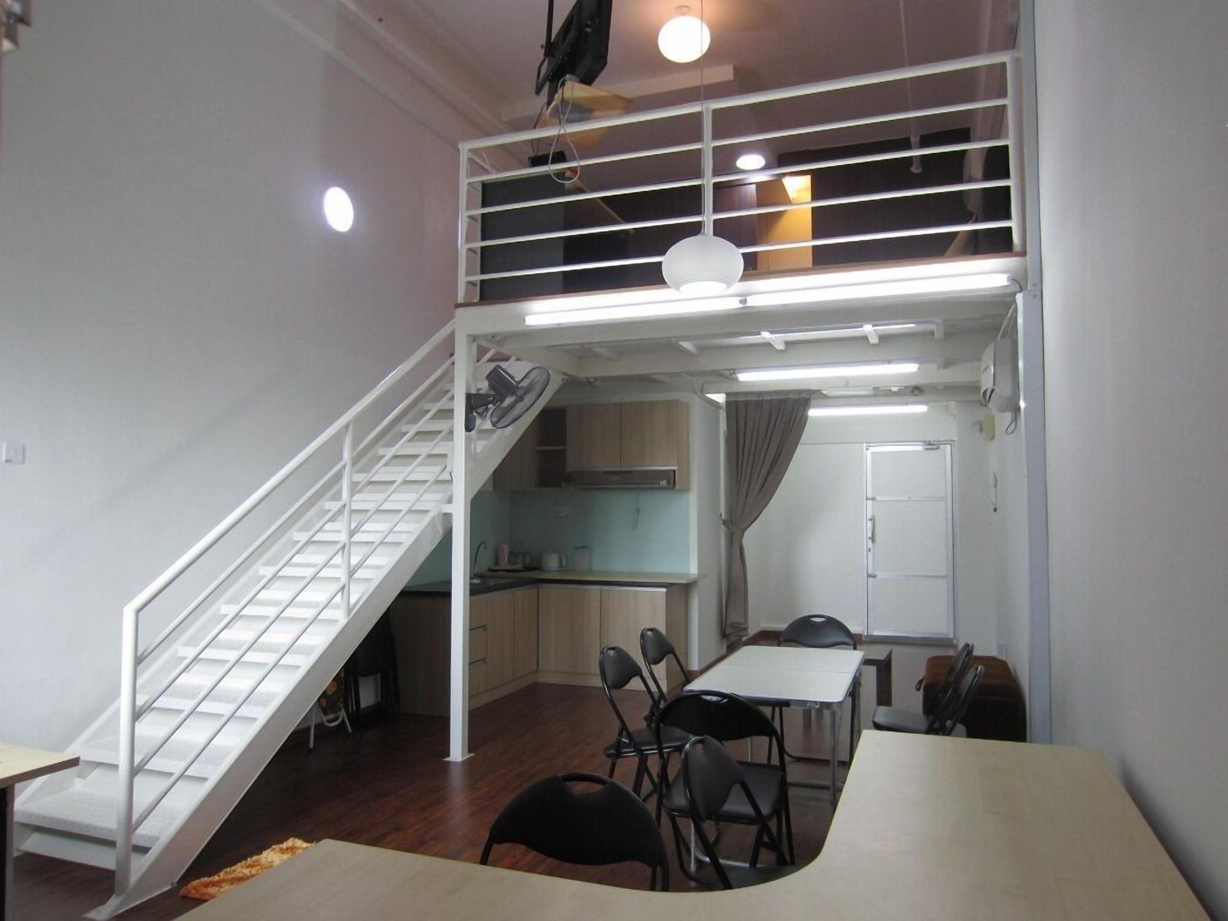 guest house family suite @ the ceo | desk, soundproofing, iron/ironing board