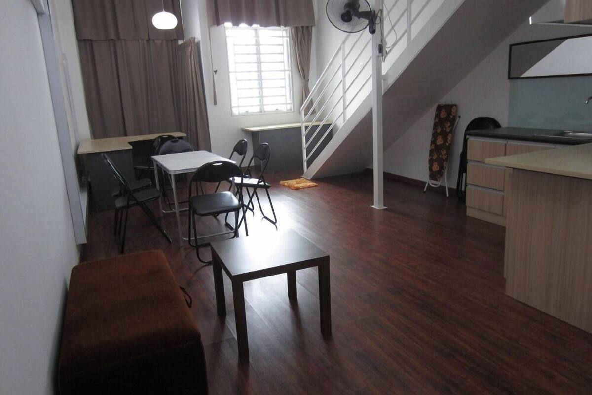 Guest House Family Suite @ The CEO | Desk, soundproofing, iron/ironing board